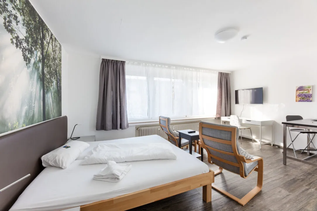 Apartmenthaus für die Langzeitmiete in Düsseldorf mit ausgestatteter Küche und wöchentlicher Reinigung